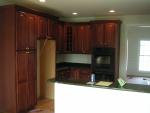Looking into kitchen from morning room into kitchen with Pantry on left and place where fridge will be, double wall ovens also v