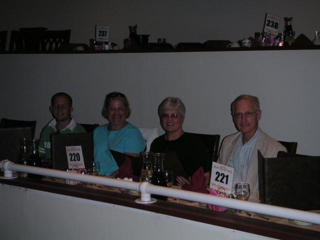 Travis, Lynne, Mom, and Gene in our balcony showboat seats